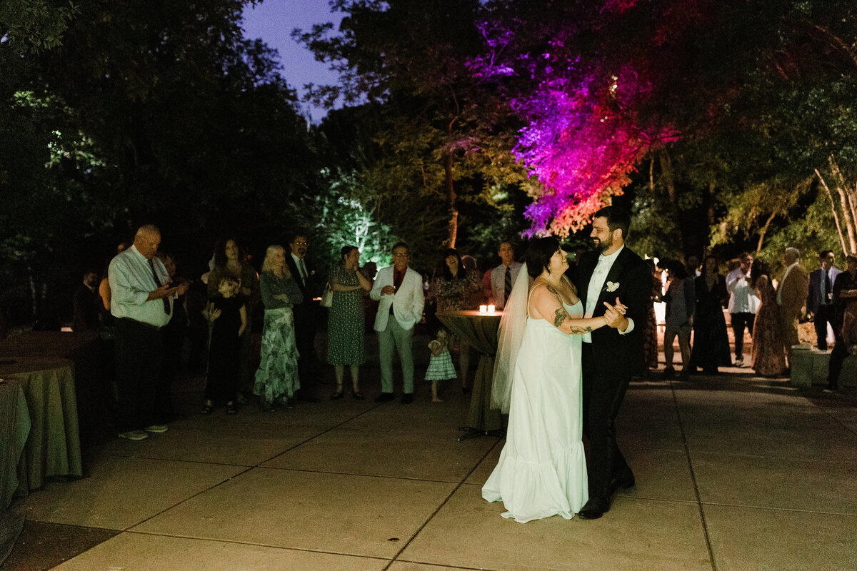 Bride and groom first dance at Umlauf Sculpture Garden, Austin