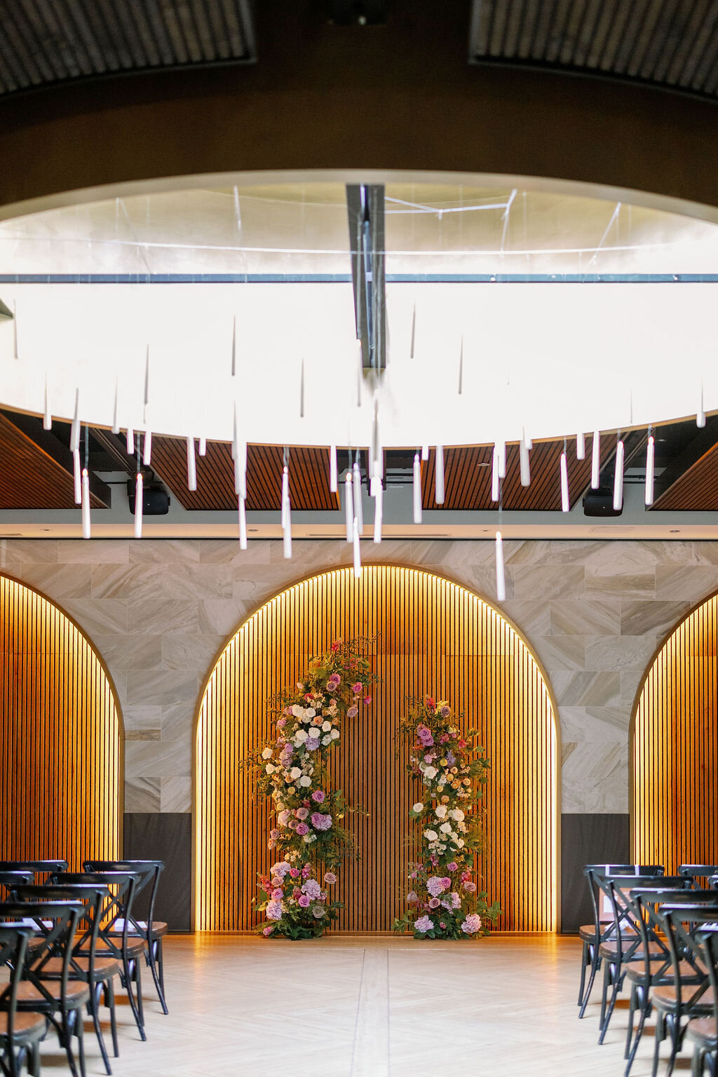 lush rose greenery disconnected ceremony arch