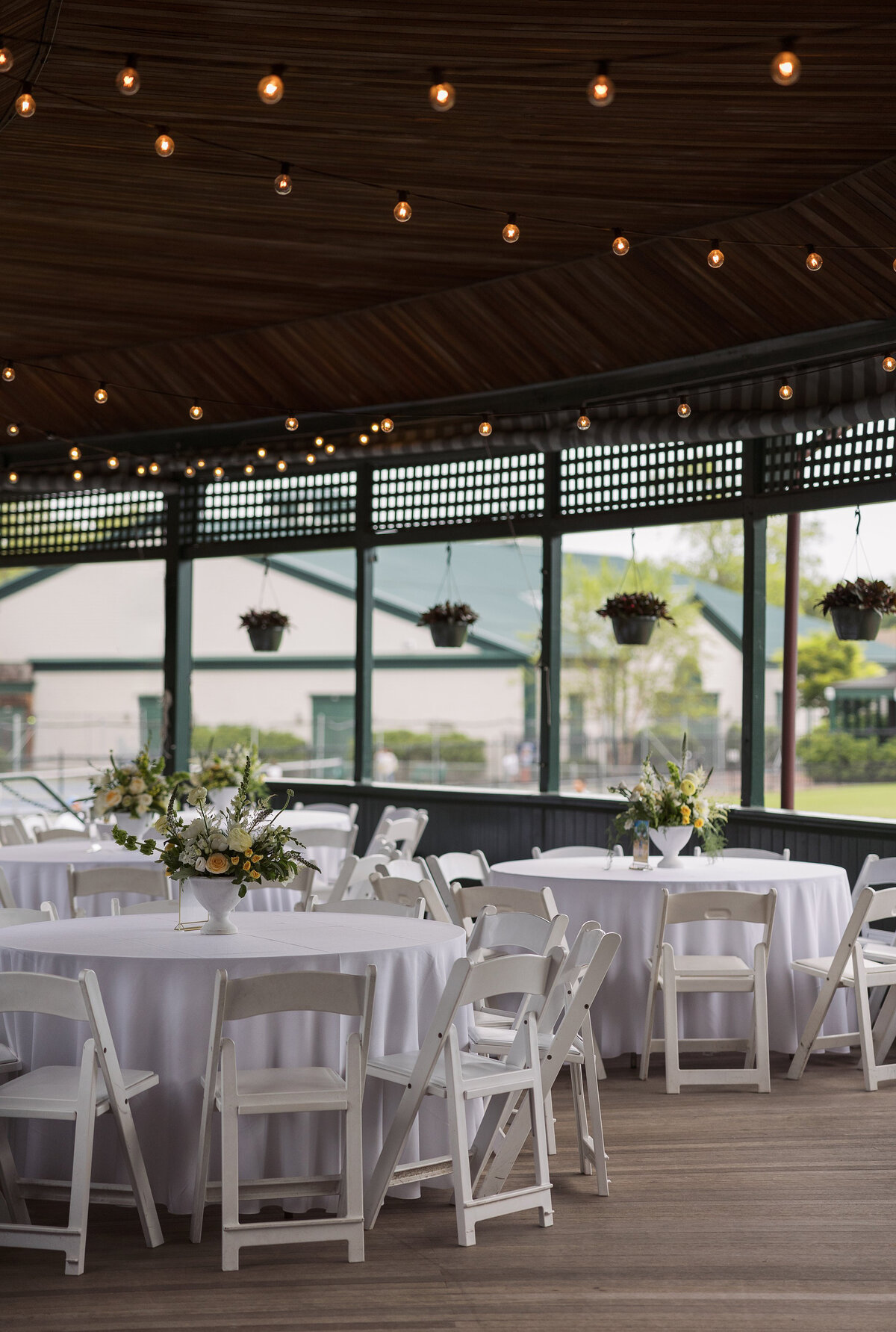 Seating arrangement on the porch of the Tennis Hall of Fame in Newport Rhode Island. Deborah Zoe Photography.