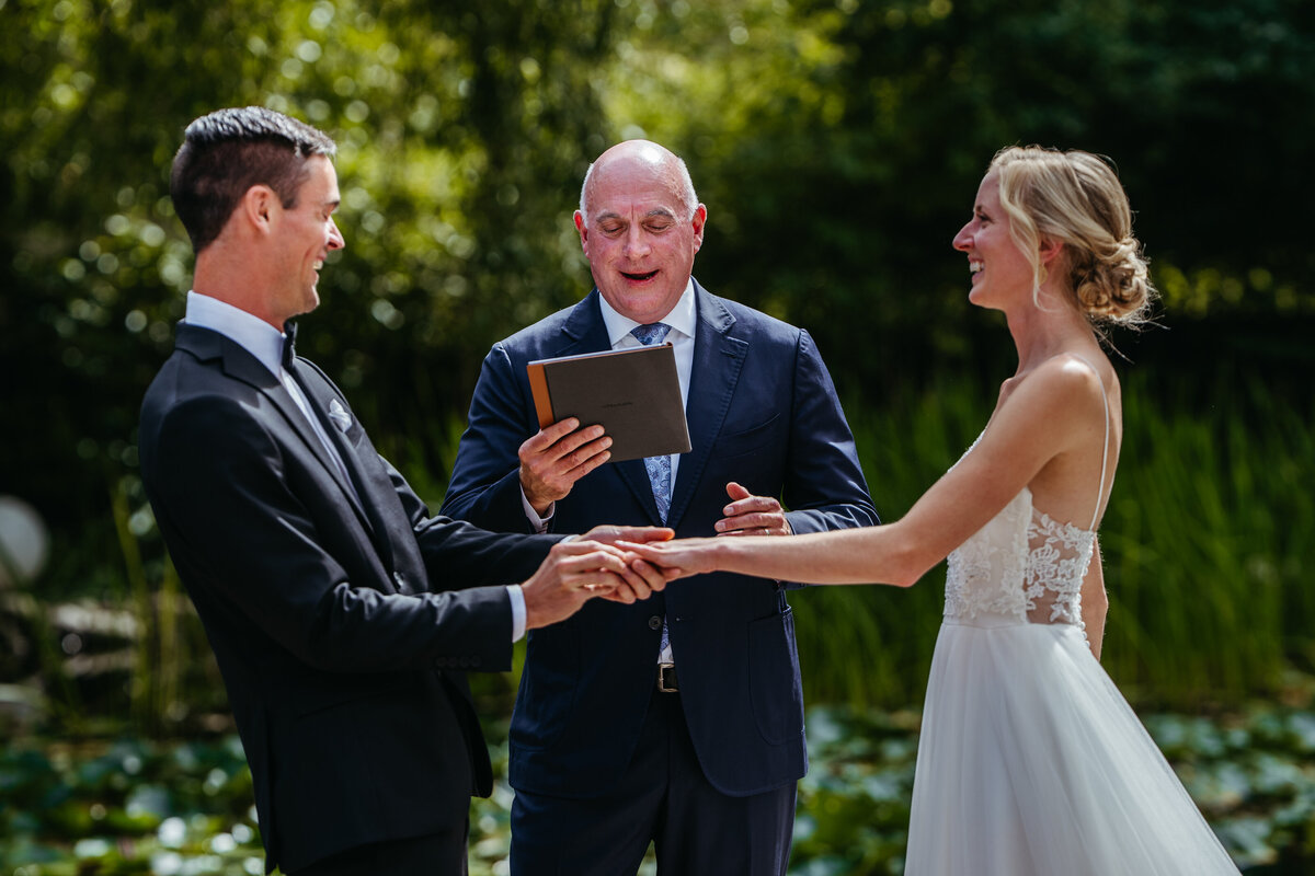 vegan wedding ceremony on natural pond dock