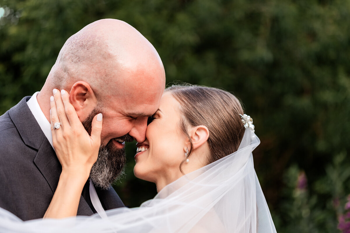 Bride and groom go in for a kiss
