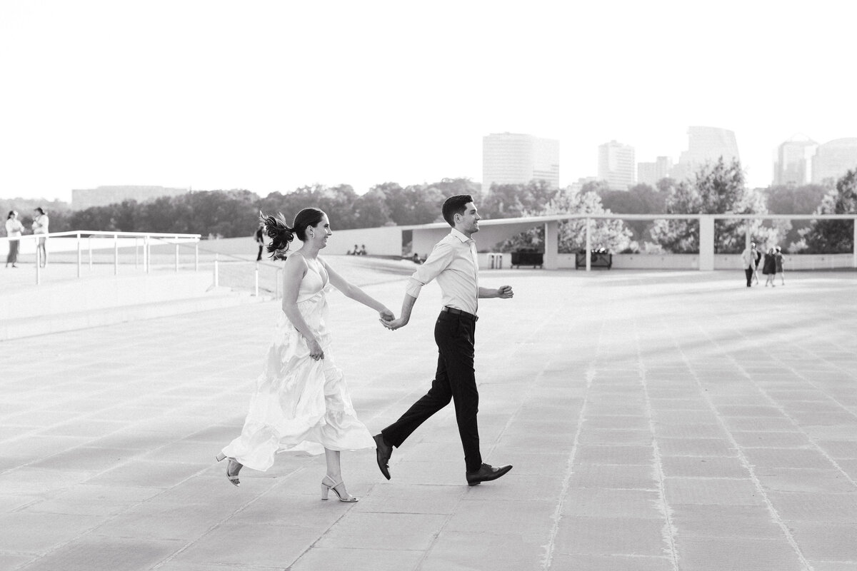 Black and white photograph of a summer downtown DC Kennedy Center engagement