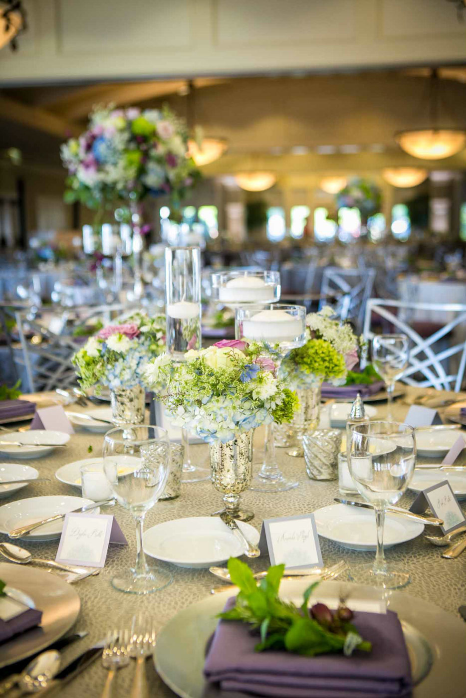 centerpiece with green, purple and blue flowers