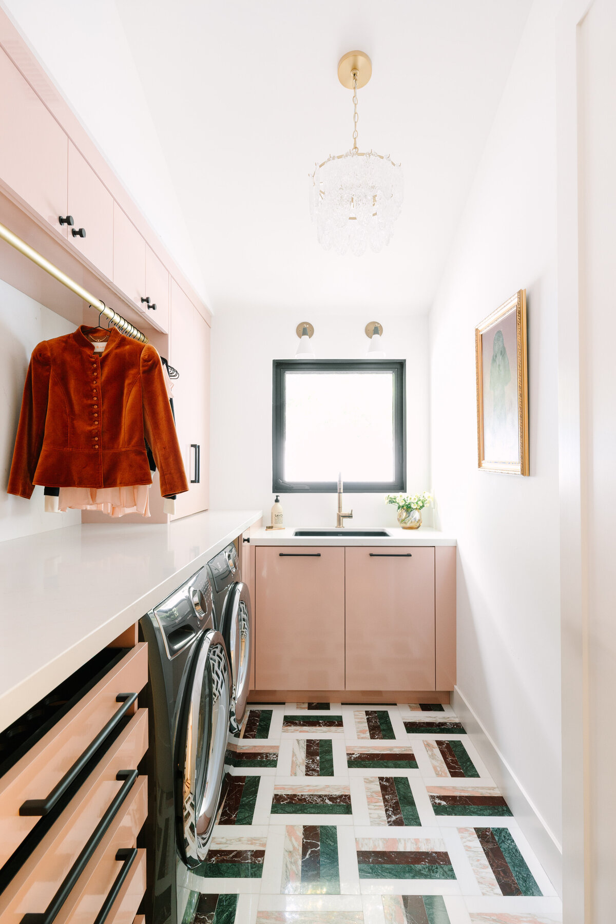Modern Hollywood regency laundry room with pink high gloss cabinets, Caesarstone Quartz counters, and Arc Passion 12x12 Polished Marble By Elizabeth Sutton: Pattern 12 flooring with pink, green and burgundy marble.