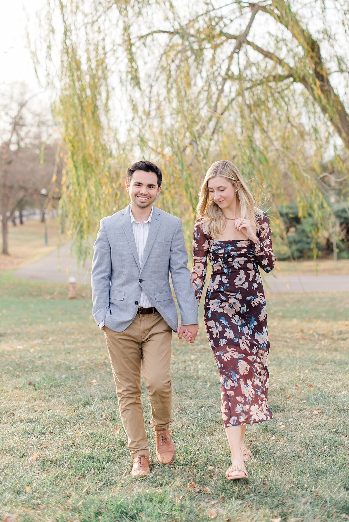The best Columbus, Ohio Wedding Photographer poses couple at Franklin Park engagement session