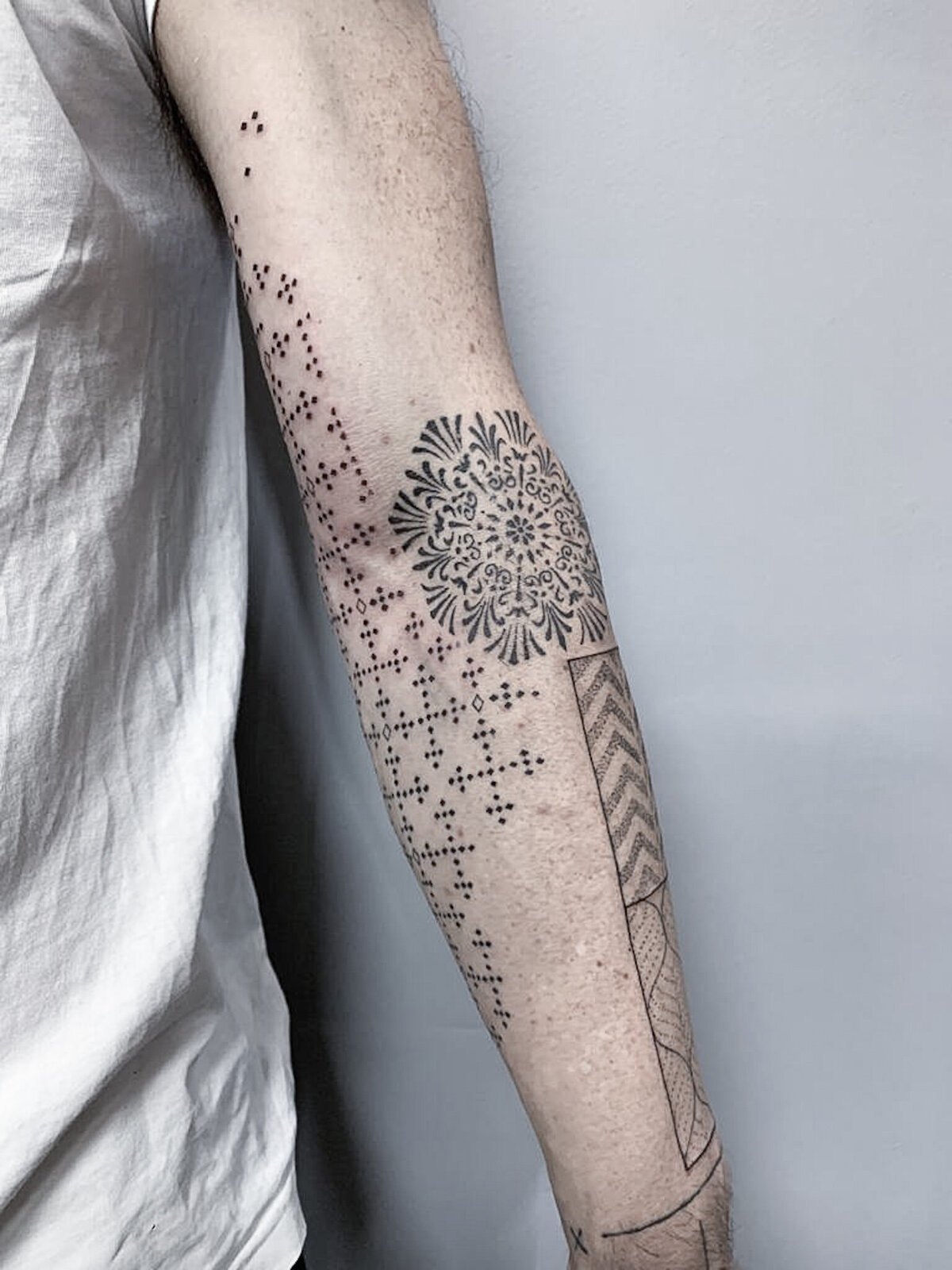 sleeve tattoo, mandala tattoo, cross tattoo, pattern tattoo