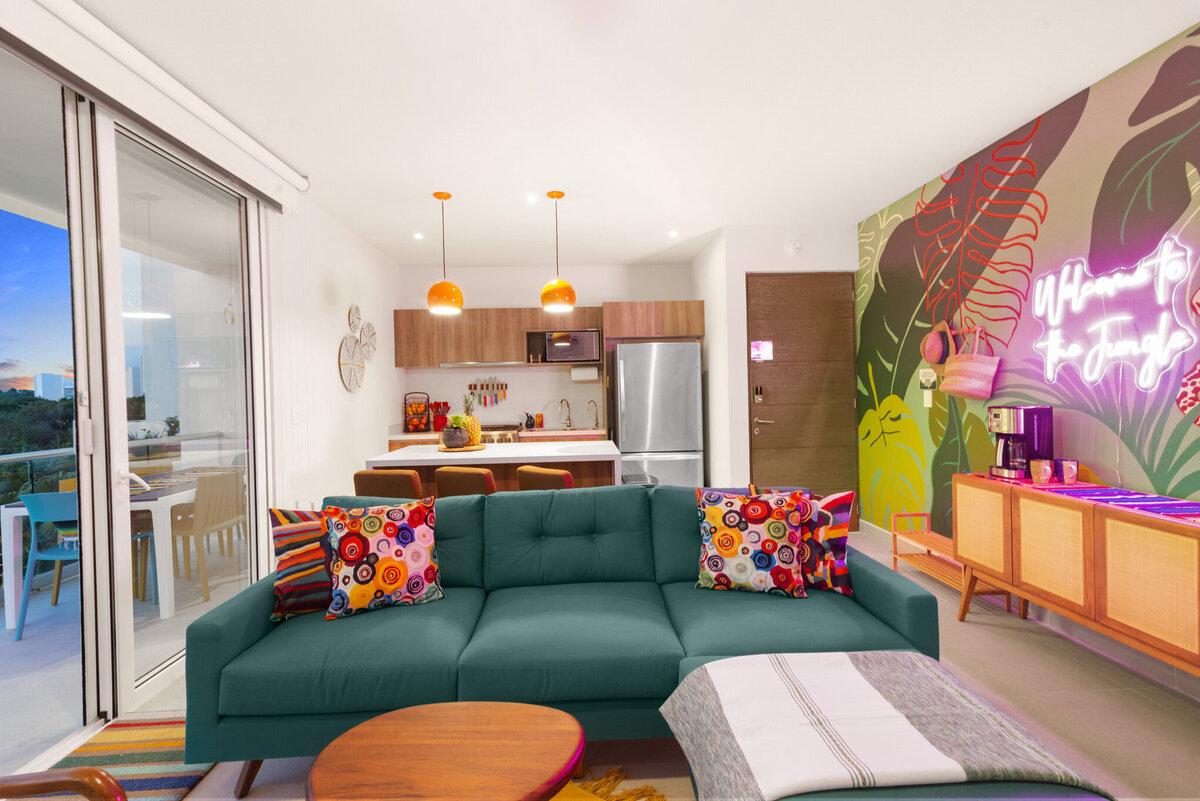 Nighttime View of Living, Kitchen & Mural