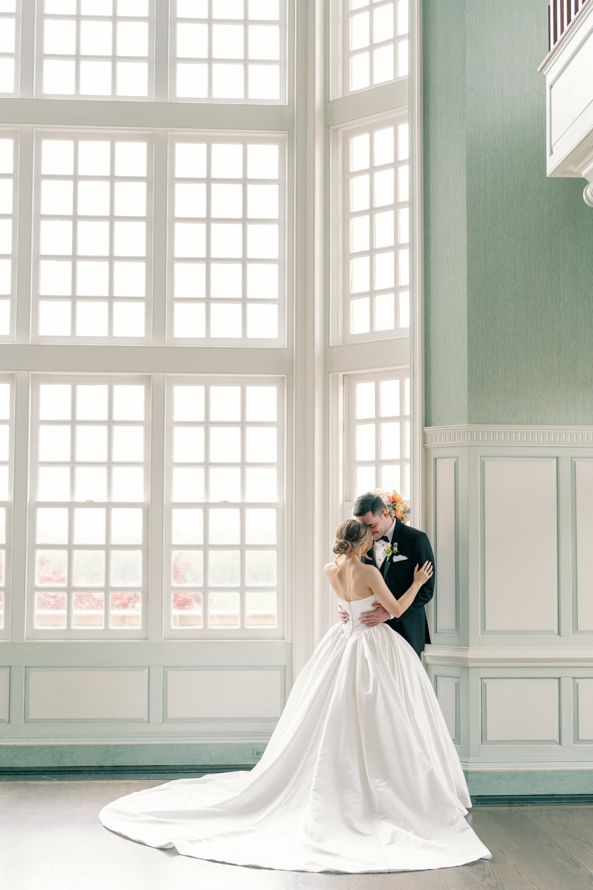 Wedding at the Estate at River Run in Maidens, VA | Wedding Photographer in Richmond | bride and groom looking at each other while they hug in their Richmond wedding venue