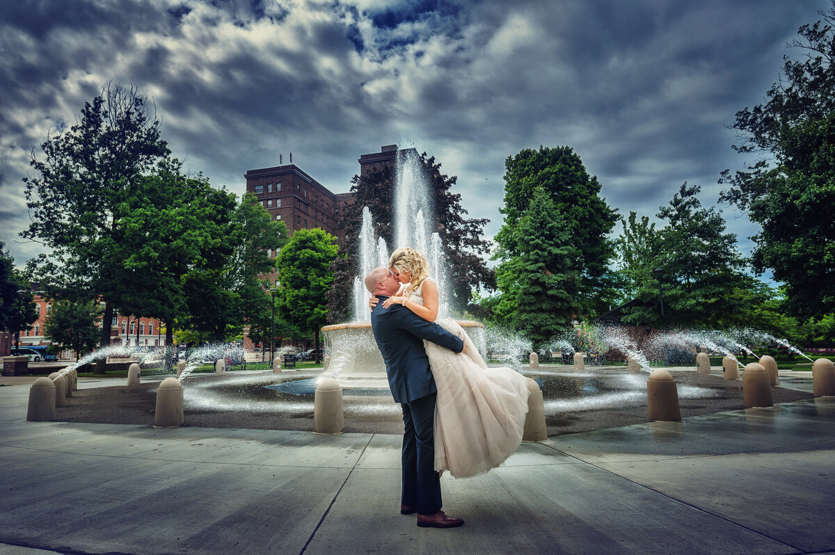 Bride and groom dancing in downtown Erie PA  Perry Square.