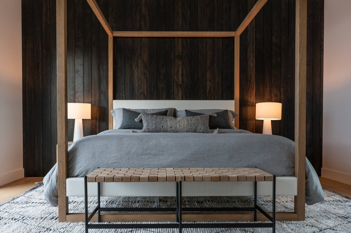 Warm Stained wood acccentt wall in a bedroom on lake pend orielle