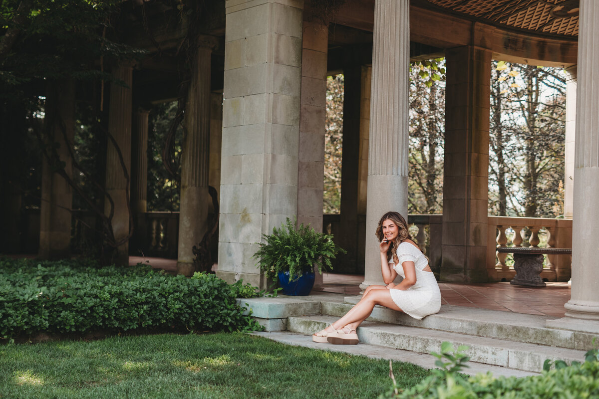 Capture your high school senior year with a timeless and sophisticated portrait session at Harkness Memorial Park in Connecticut. With its grand architecture, lush gardens, and serene coastal backdrop, this location offers a stunning setting for senior pictures. Book your session today for elegant and natural senior portraits that reflect your unique style and personality!