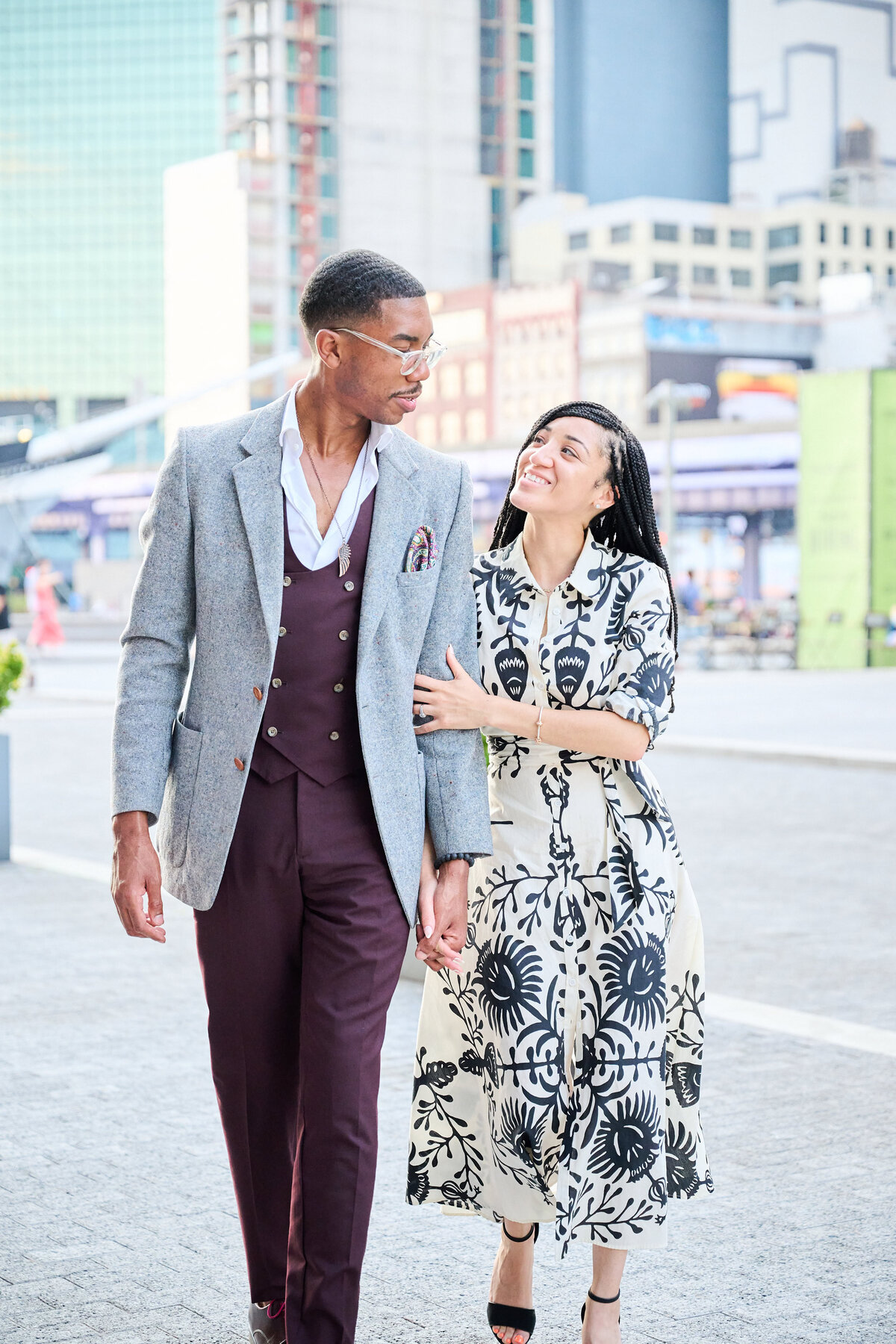 Couple walk together after proposal in South Street Seaport in New York City, New York City Proposal Photographer Corey Lamar Photography