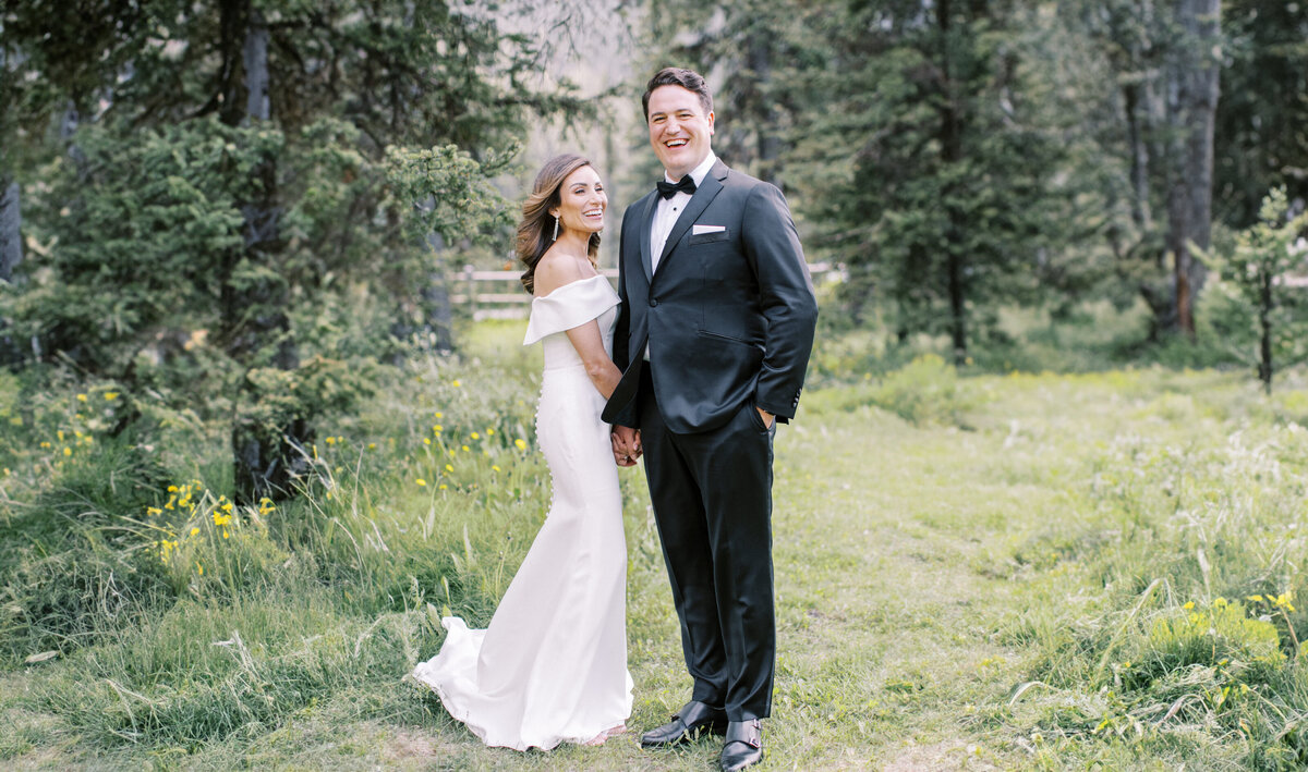 portrait of bride and groom in the wood at their Calgary wedding designed by Julianne Young weddings and photographed by Calgary wedding photographers David and Breanne Heidrich