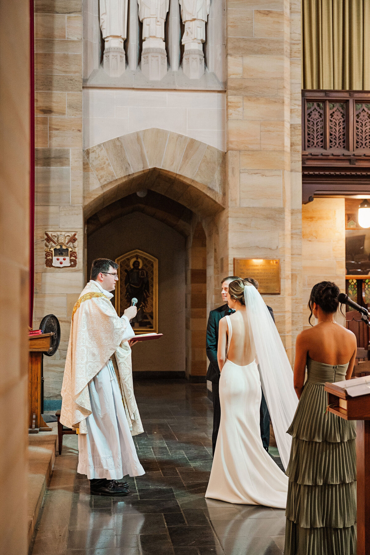 bride and groom wedding ceremony at sacred heart church pittsburgh