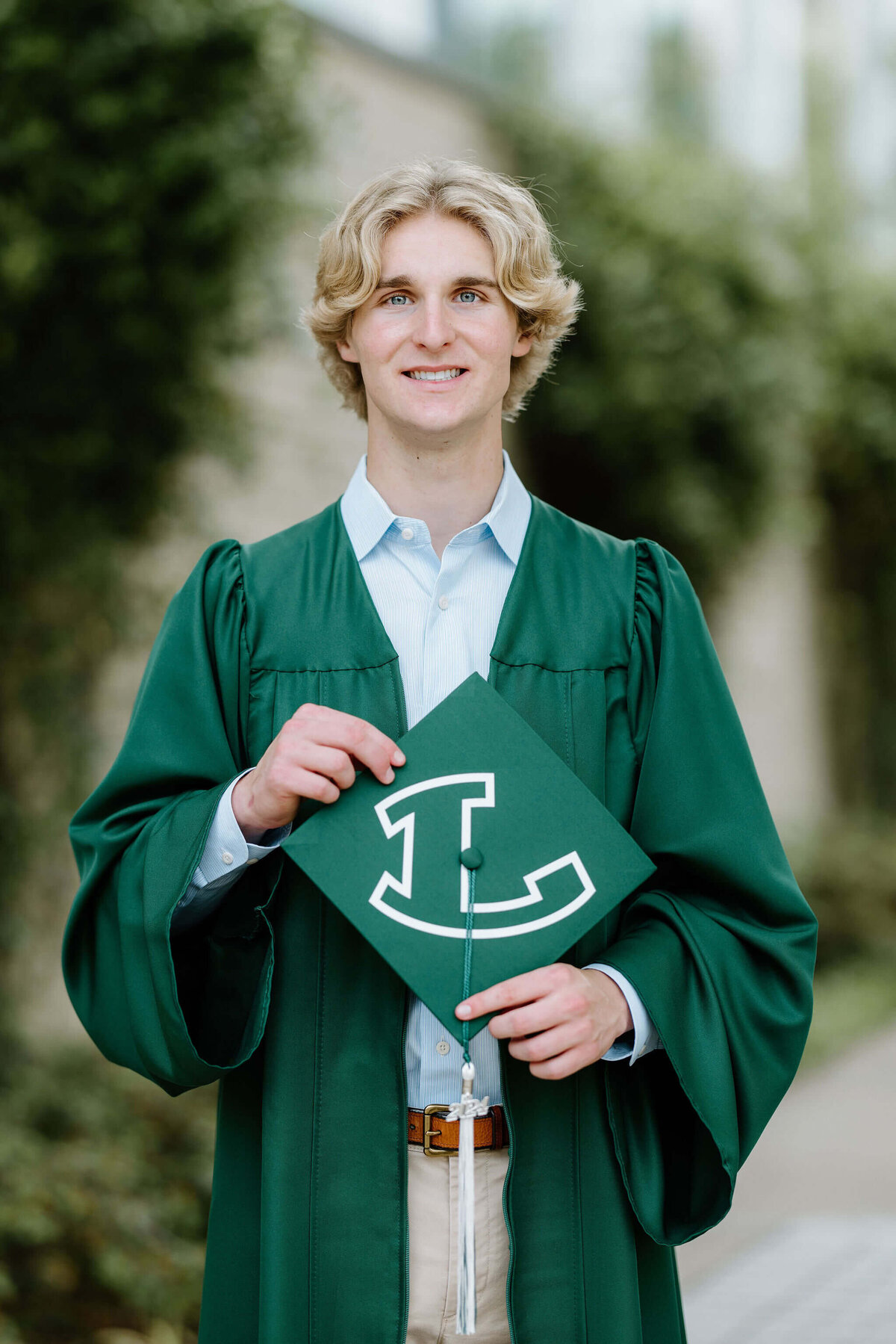 Longview Lobo graduate in cap and gown