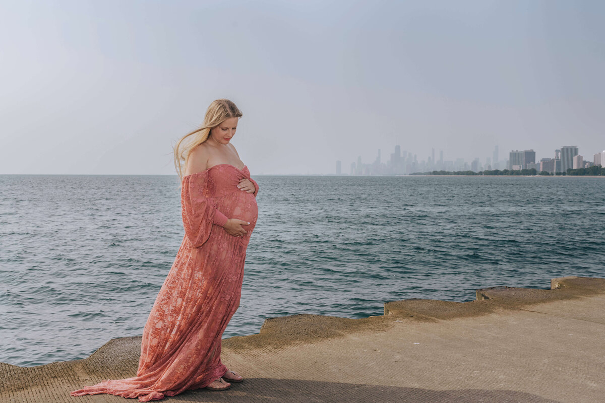 Pregnant woman holding baby bump