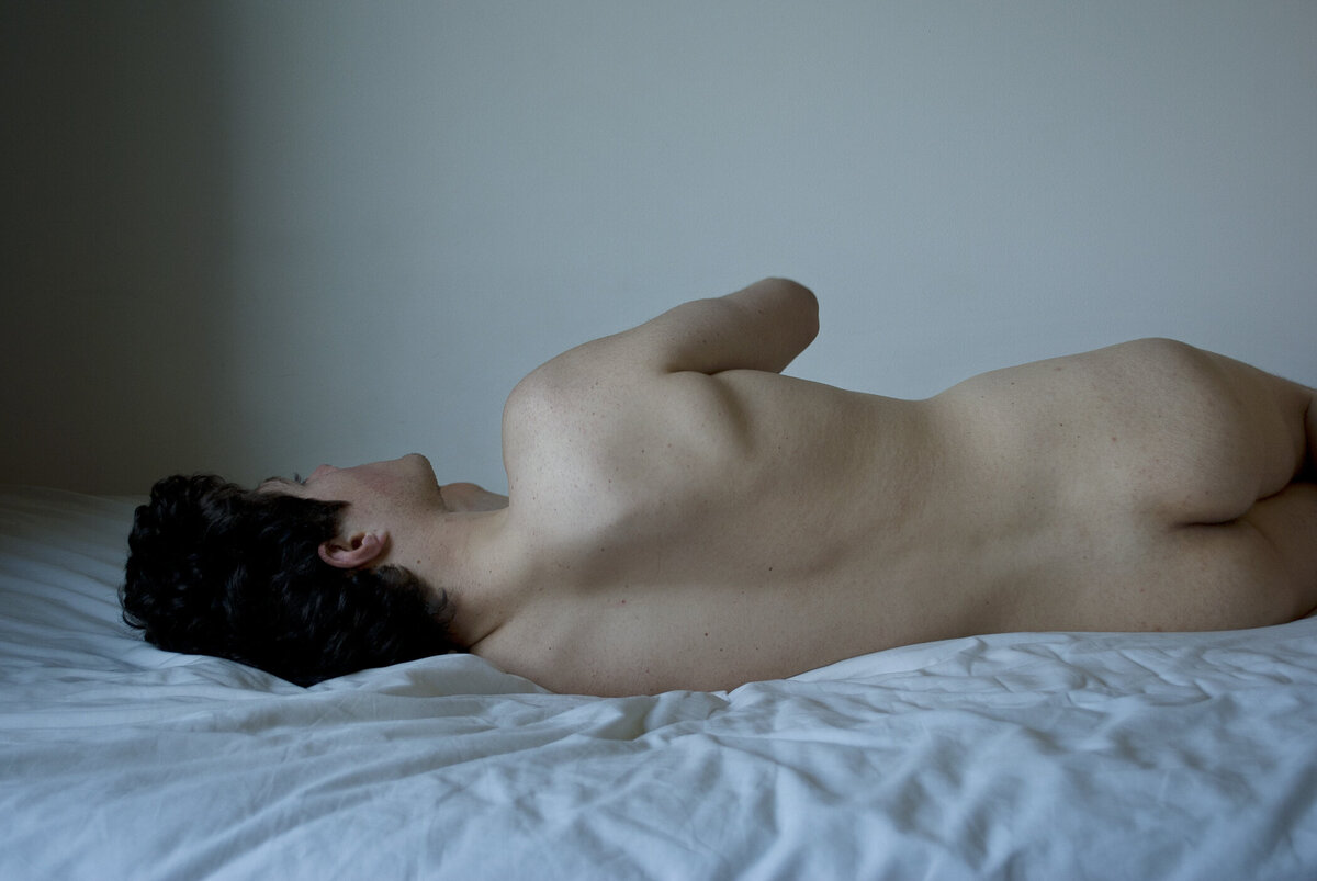 nude portrait on bed