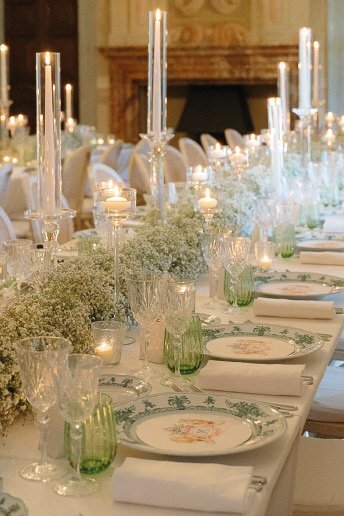 Elegant white and green table setting at luxury Villa Balbiano at Lake Como in Italy 