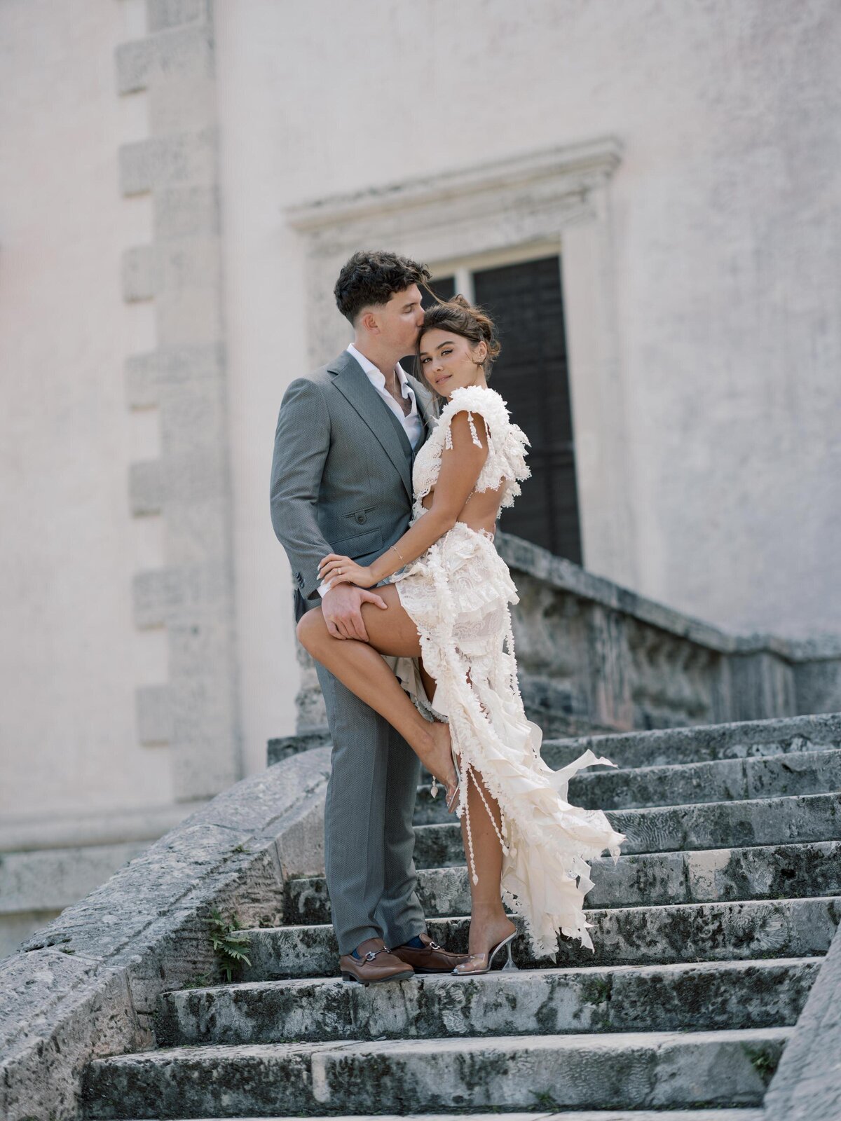 vizcaya-engagement-close-embrace-on-steps