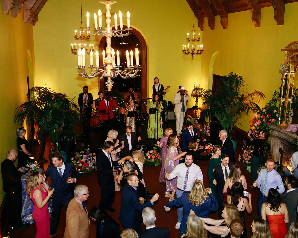 Bride and groom embrace in the ornate Paramour Mansion Salon. Romantic First Look portraits.