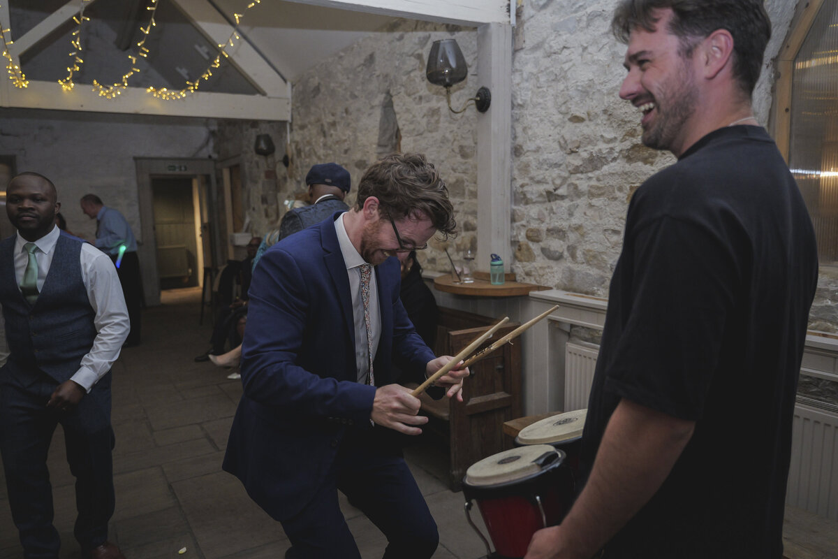 A guest playing the drums