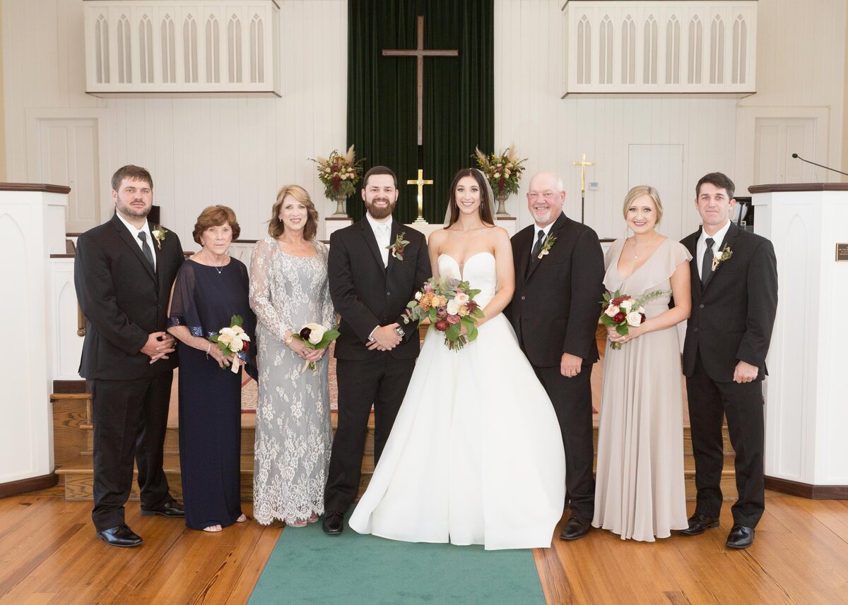 The bride and groom's formal photos at St. Francis on the Point in Point Clear, Alabama.
