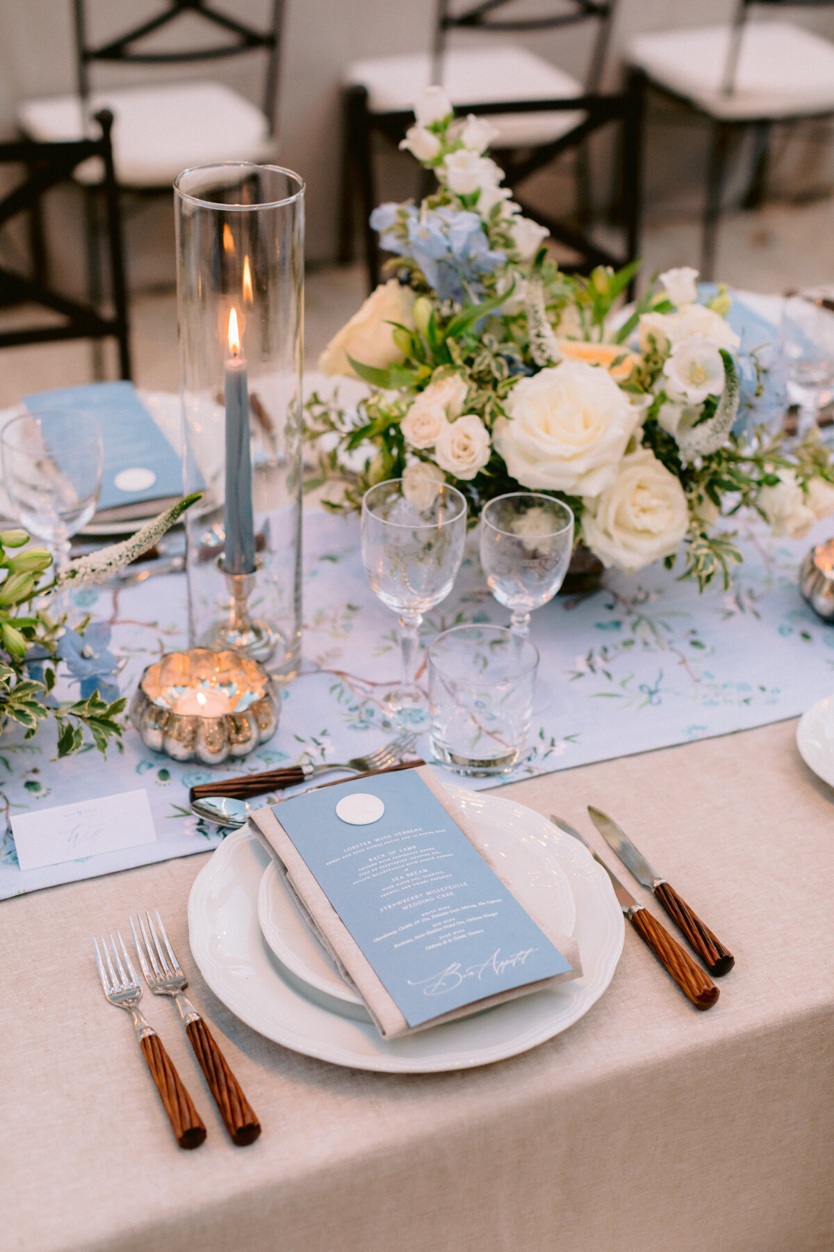 Elegant tablescape for outdoor wedding dinner