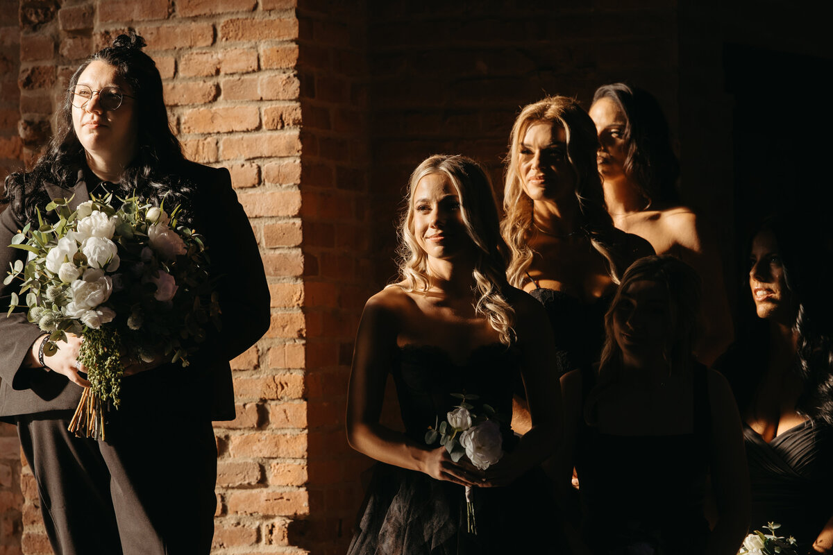 bridesmaids during golden hour wedding ceremony