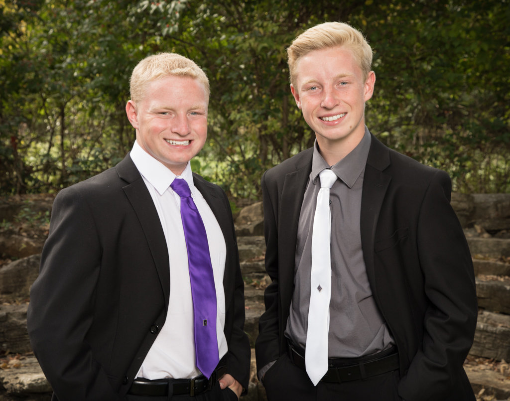 Two High School Senior Boys Posing for Pictures