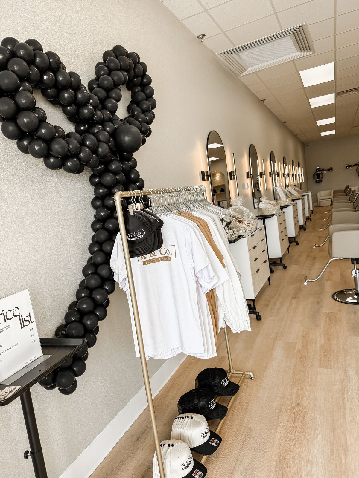 store grand opening balloons - black balloon bow