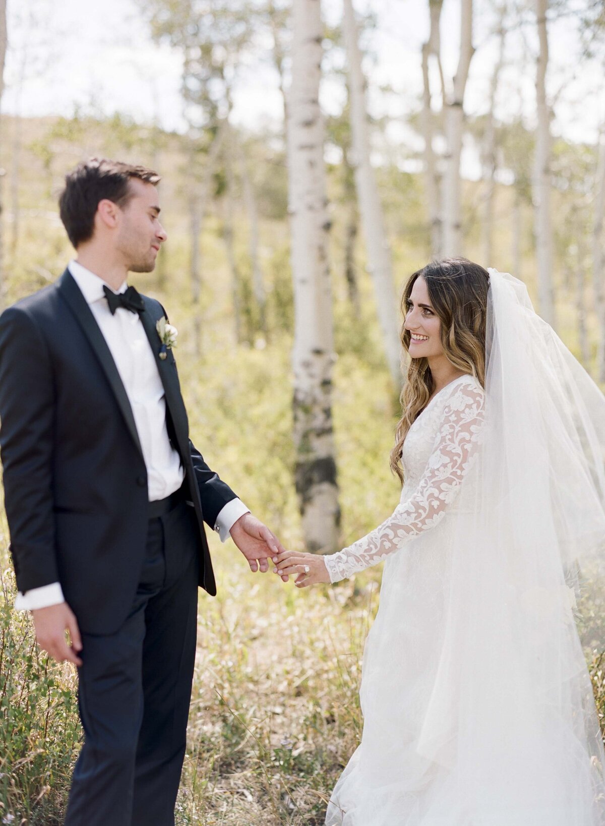 Beaver Creek Bride and Groom Touching Hands