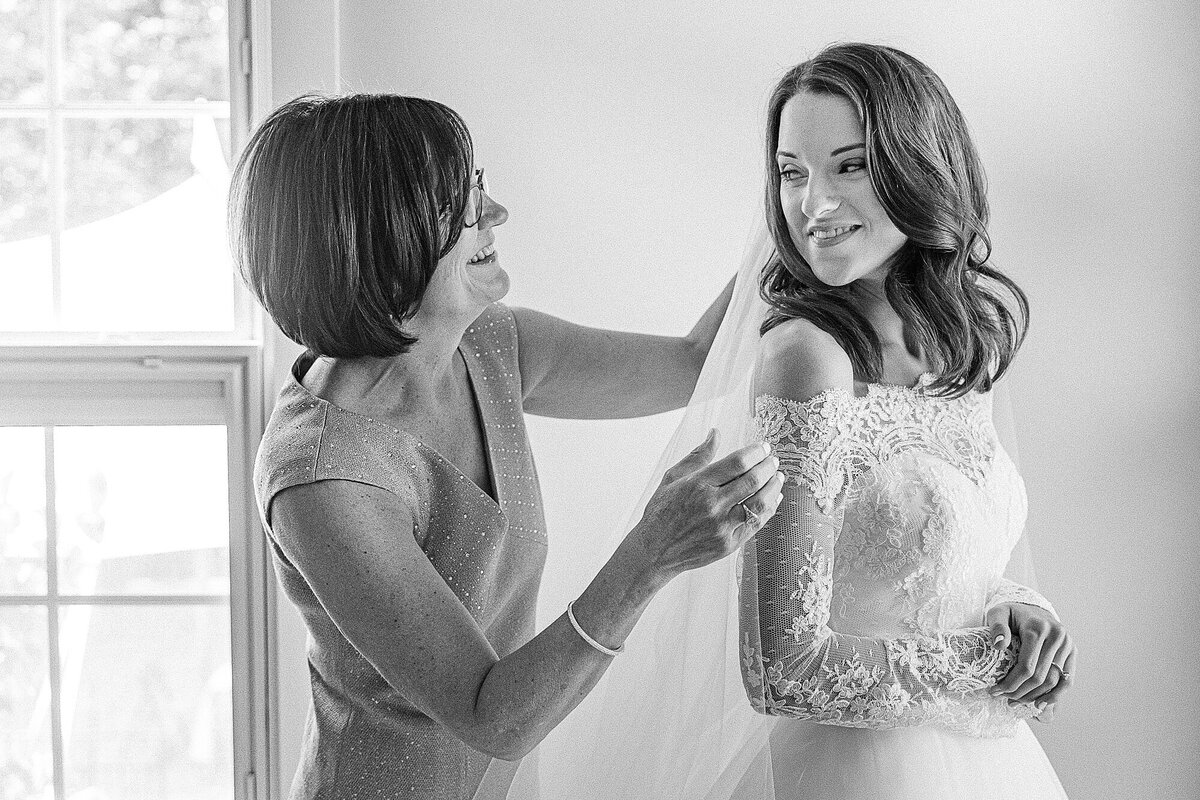 Mother of the Bride putting in the veil before an intimate estate wedding ceremony