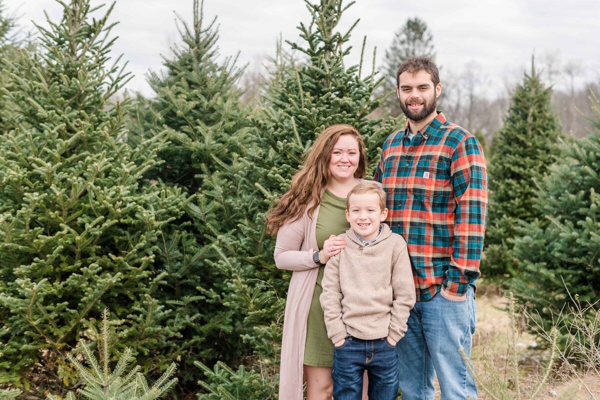 Family at christmas tree farm