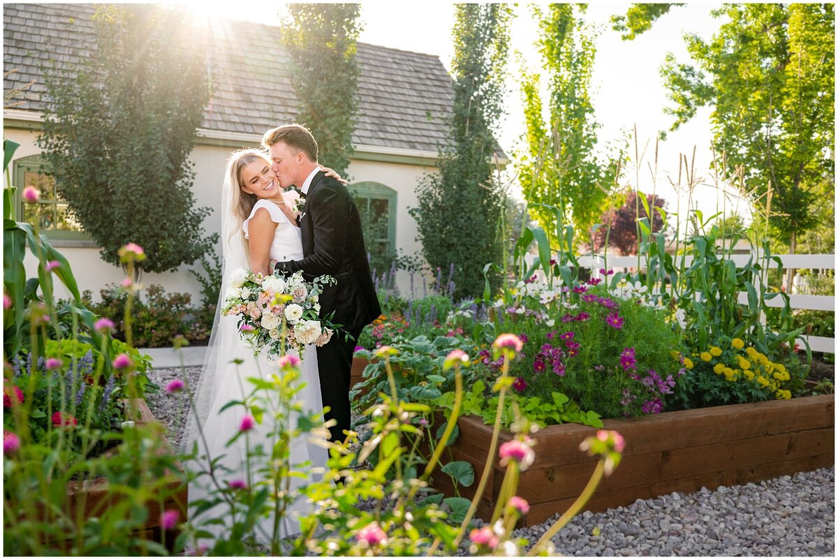Bride and groom portraits in the garden at Walker Farms