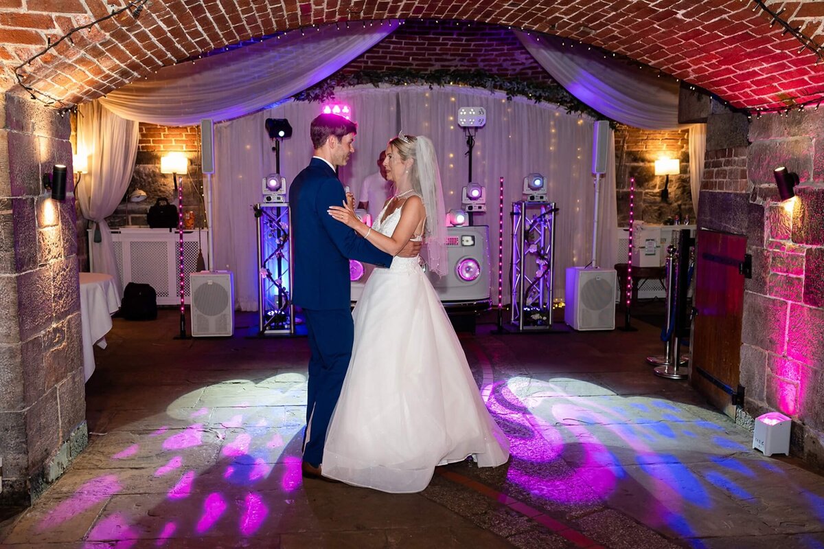 A bride and groom having their first dance