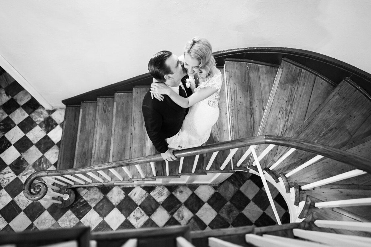 Bride and groom on stairs