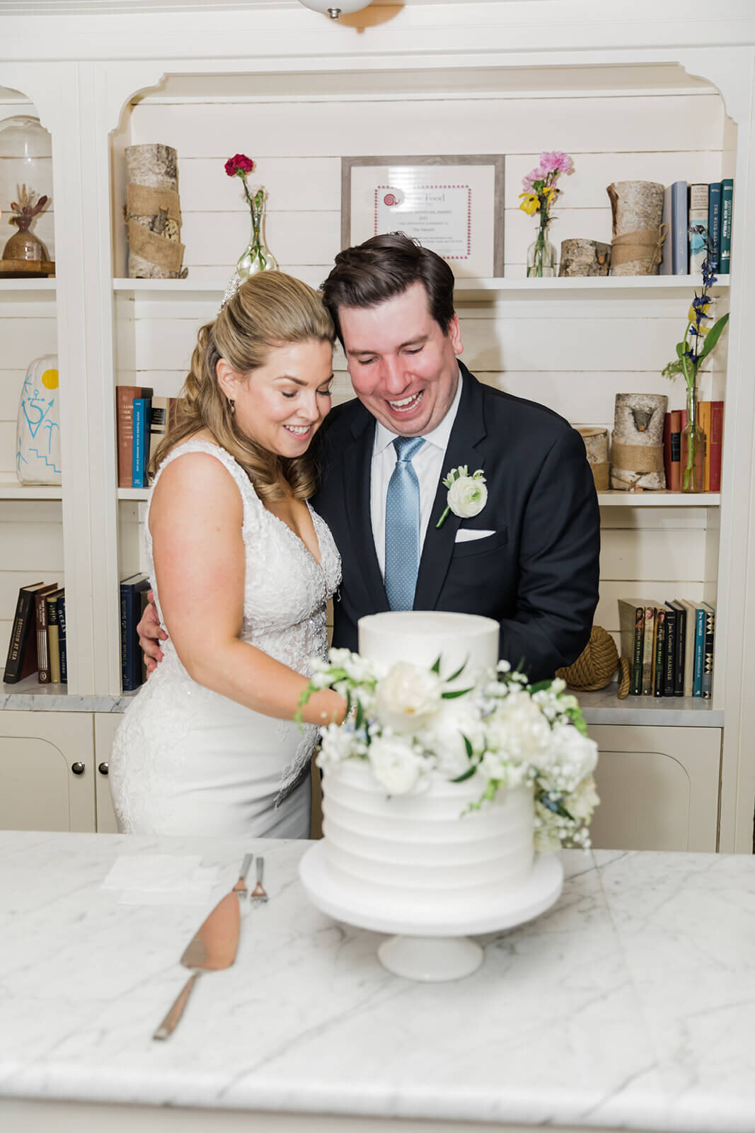 Bride and groom cutting cake at Long Island wedding New York
