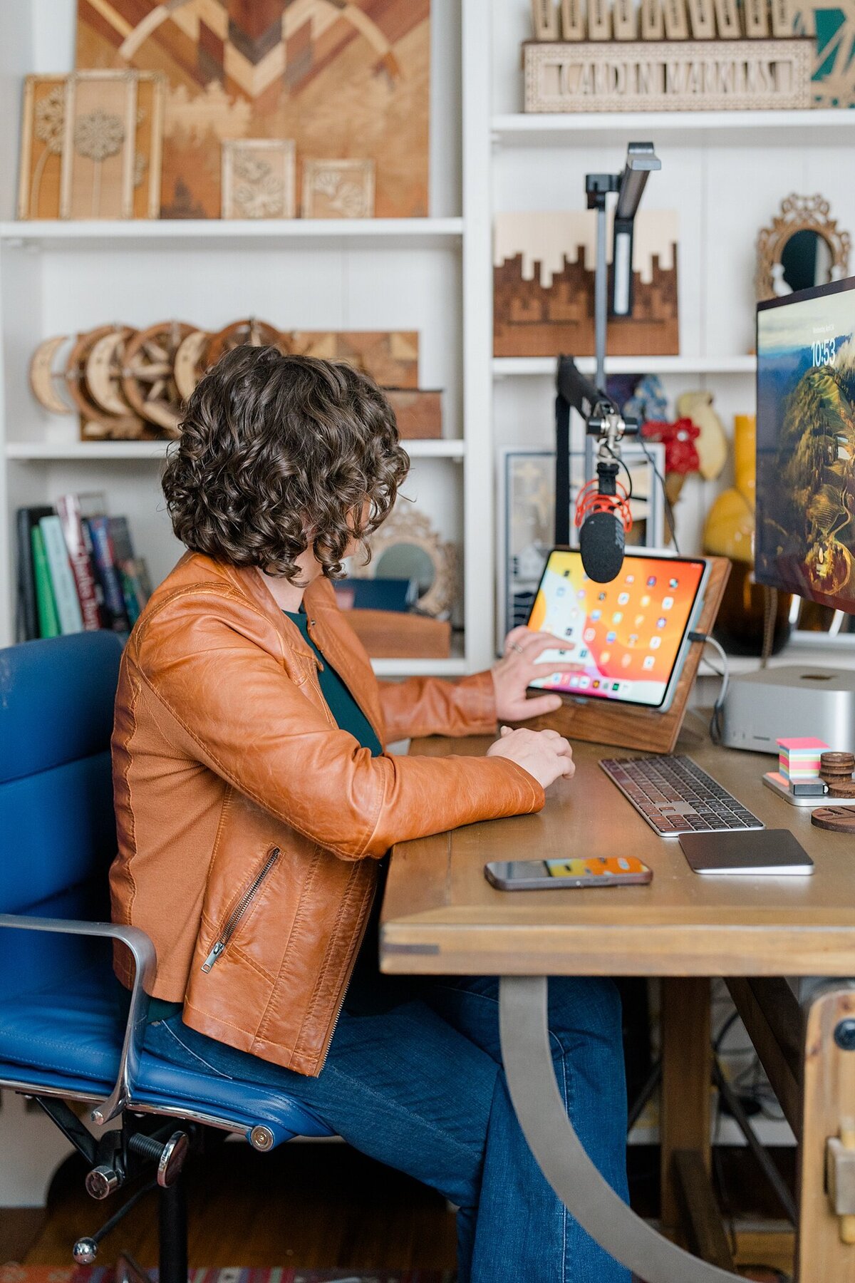 small business branding photography with woman sitting at a desk in her office with a computer