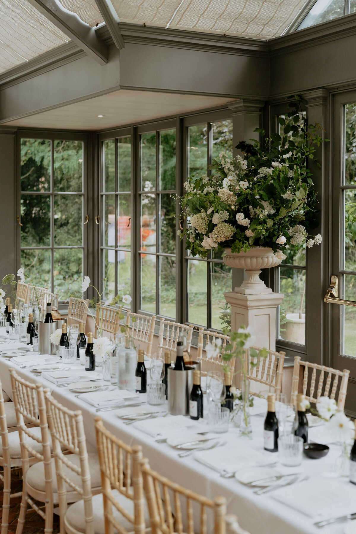 Rectory Hotel wedding breakfast tables with bud vases 