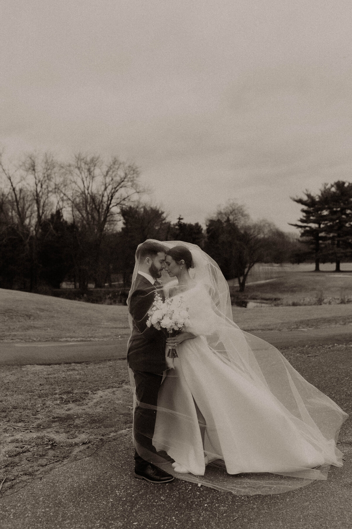 Winter wedding veil shot black-and-white