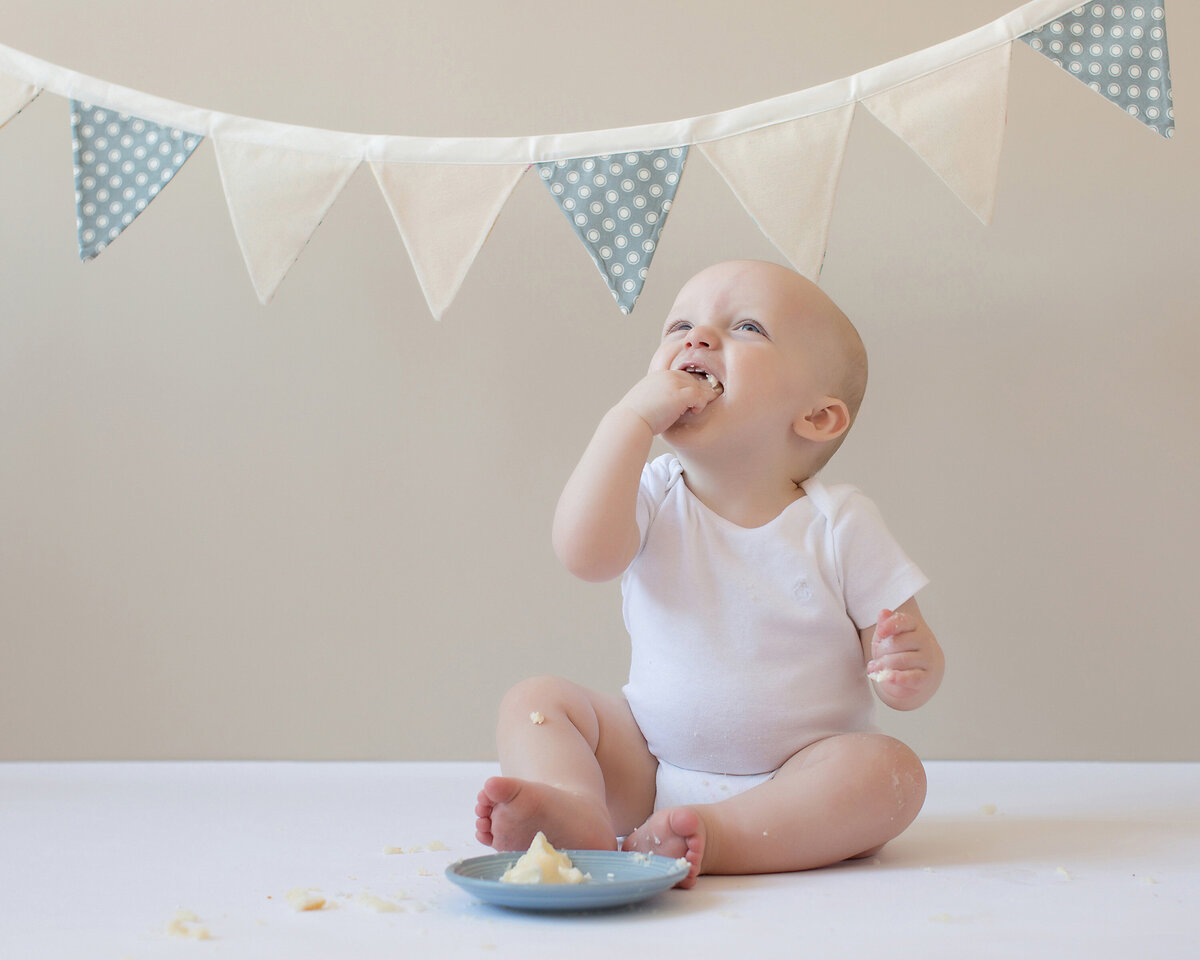 one-year-old-eating-cake