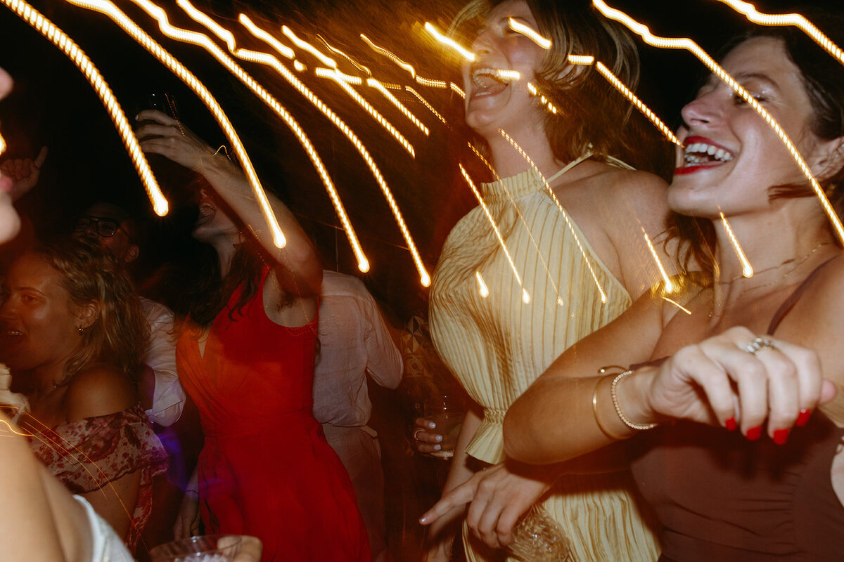 Guests enjoy music and dancing during wedding reception