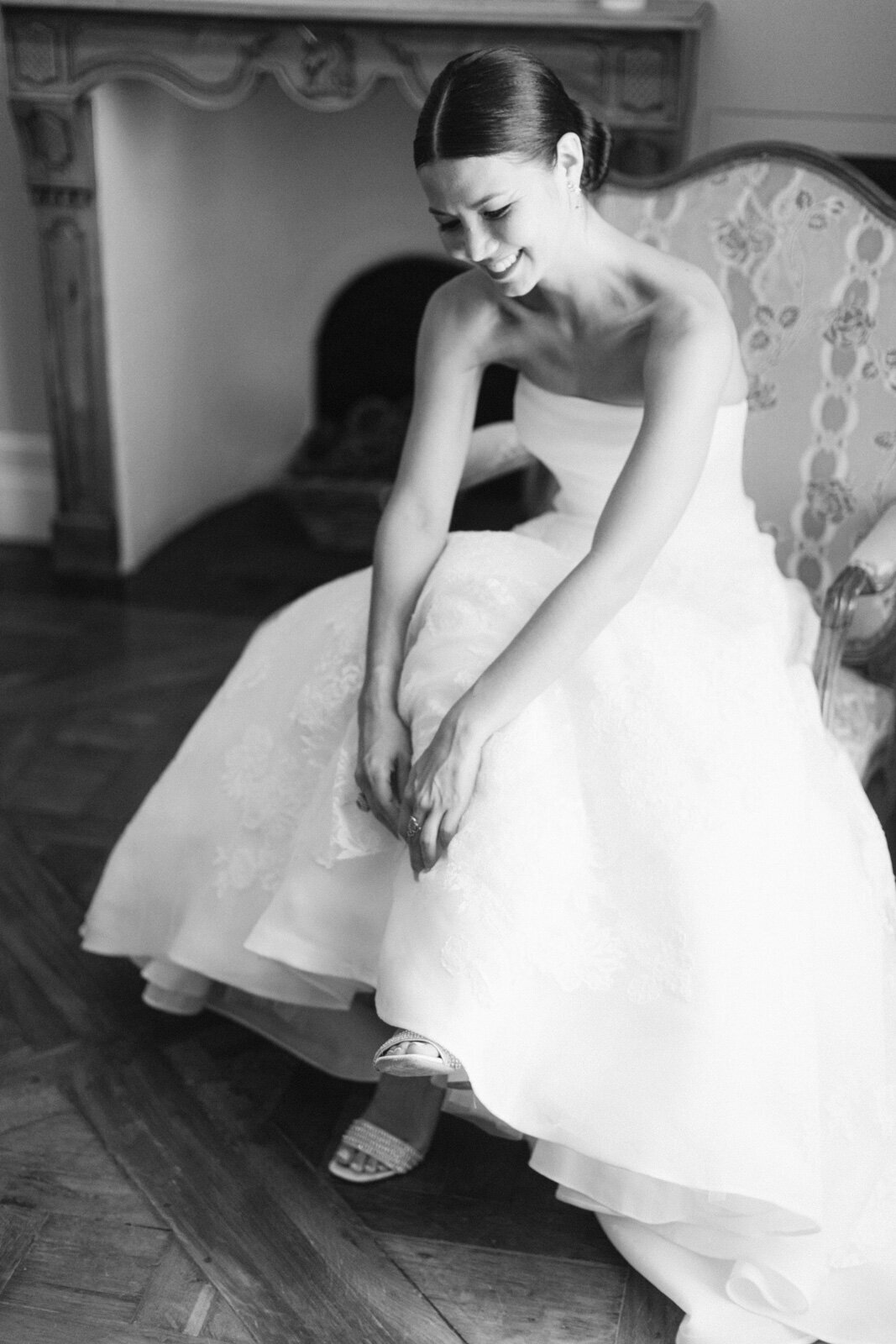 Bride getting ready on her wedding day in Provence – emotional black and white bridal portrait.