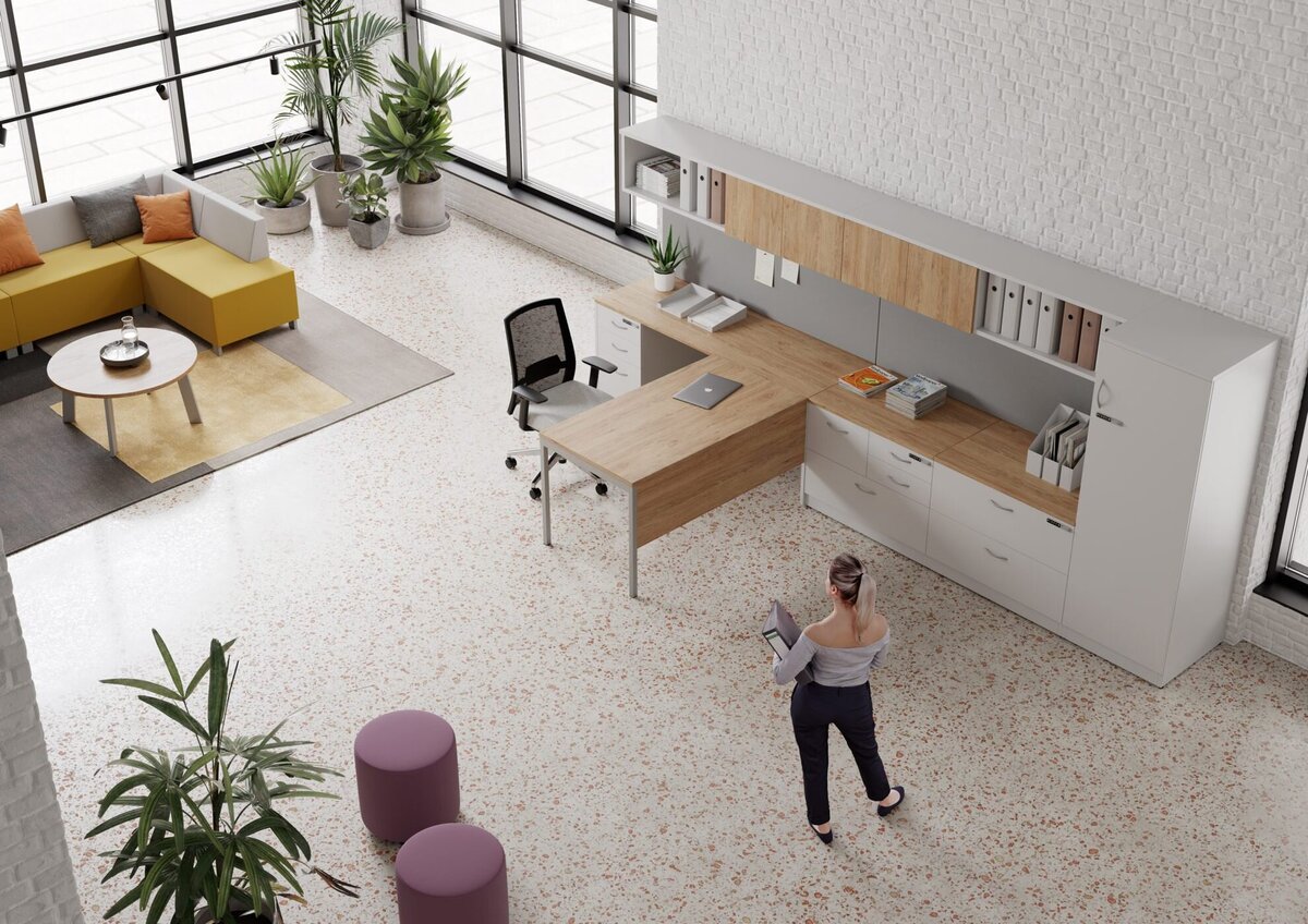 birds eye view of an open office space with minimal, modern style