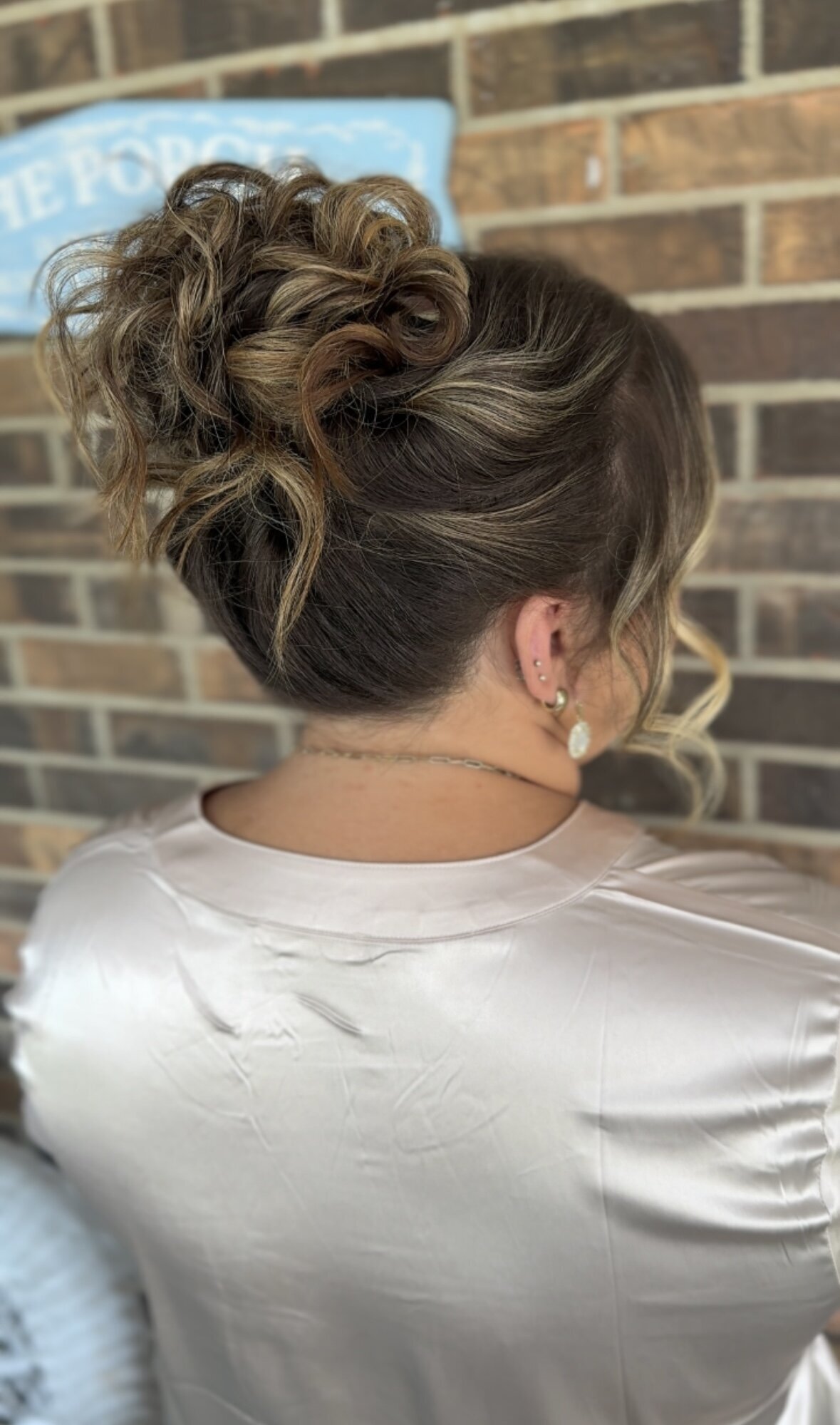high updo messy high bun bridesmaid hair inspo
