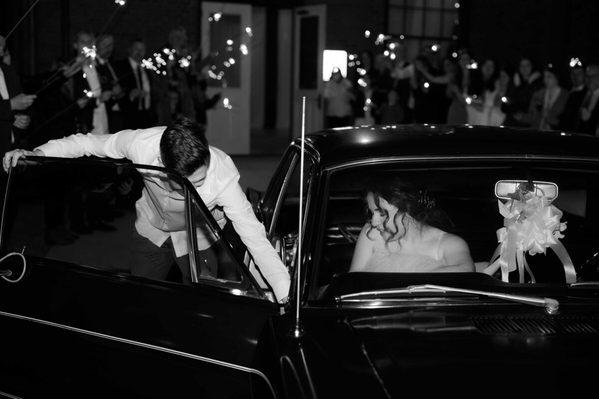 Bride and Groom in Getaway Car at The Roundhouse Depot in Huntsville Alabama