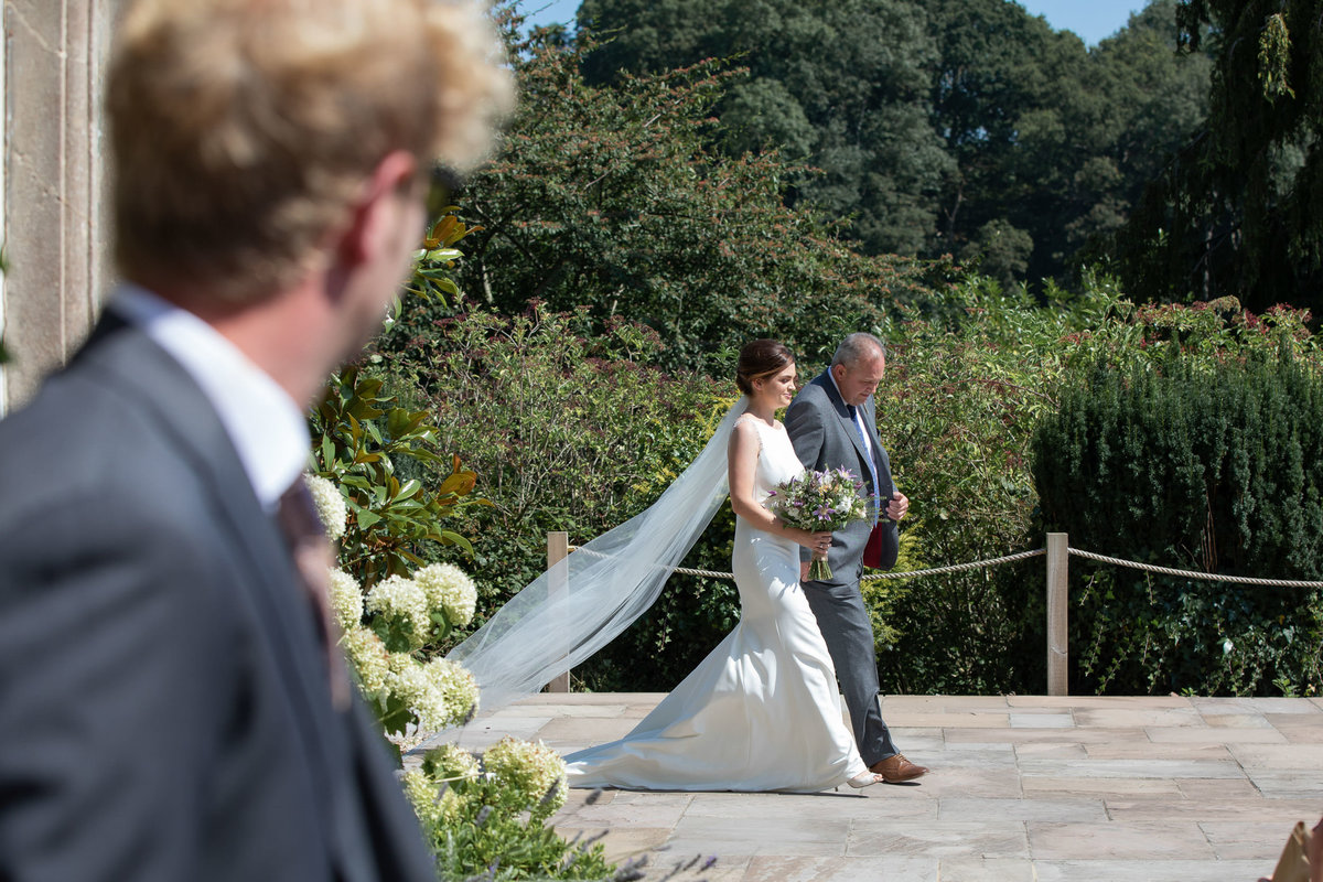 Grooms first look at Bride at their Paschoe House wedding in Devon