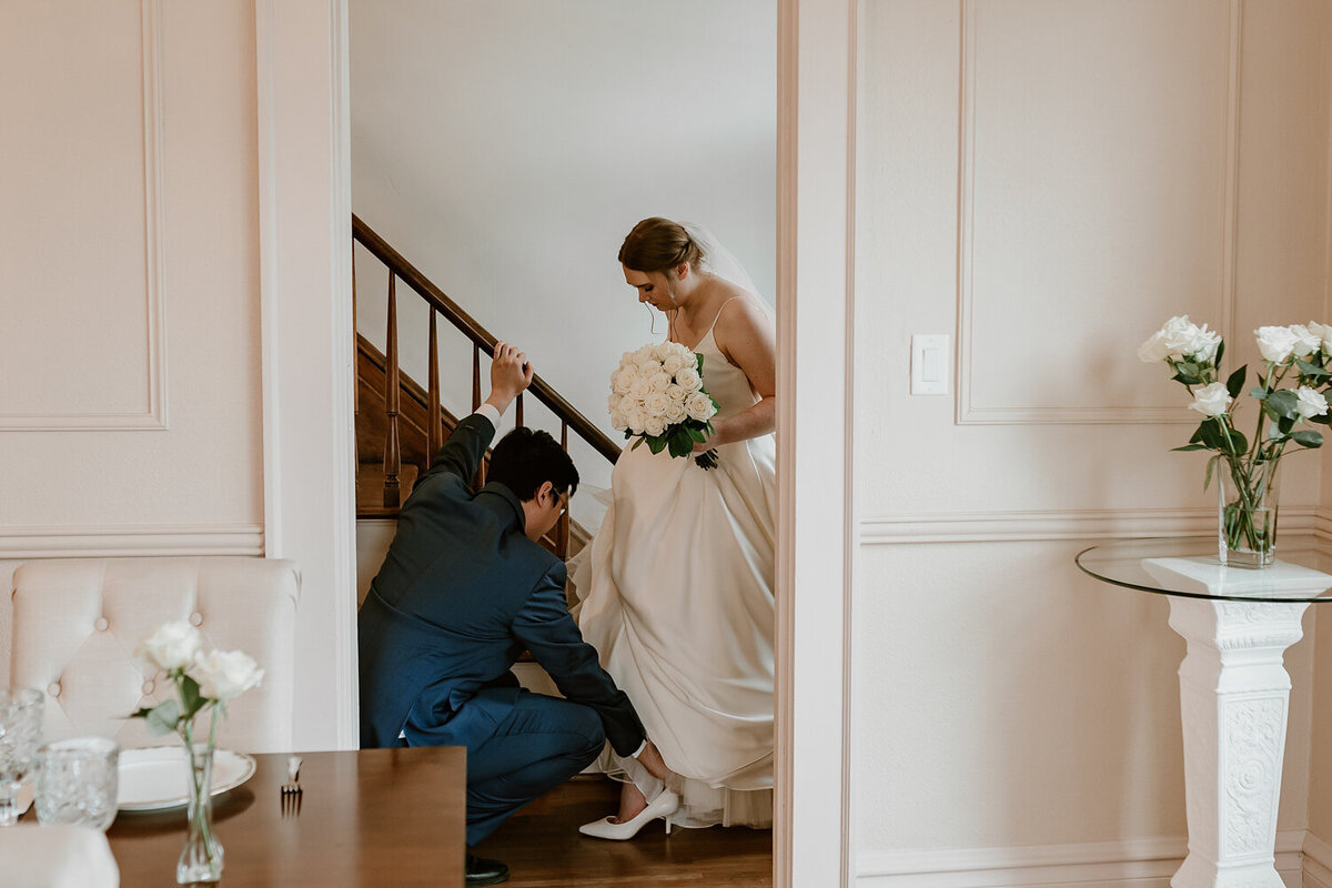 storyteller-collective-photo-co-bride-shoes-moment-sister-hill-manchester-iowa