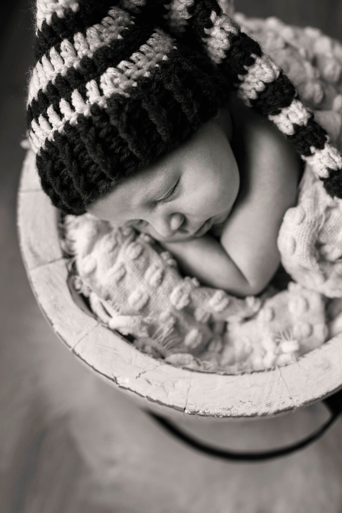 NJ Newborn photographer captures baby in sleepy elf cap