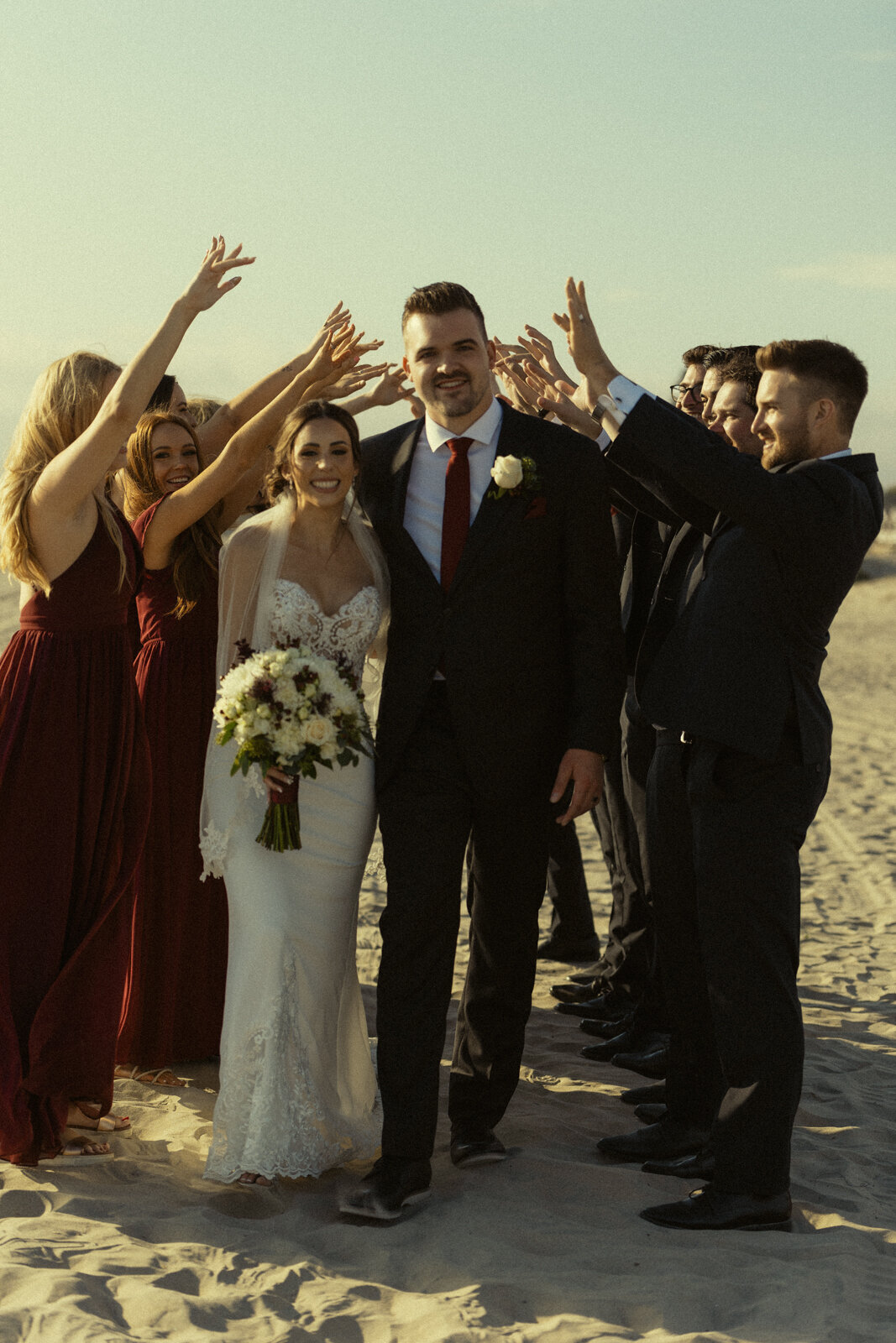 Thuy Tran Photos captured Amanda and Matt's wedding at Coronado beach in San Diego. 